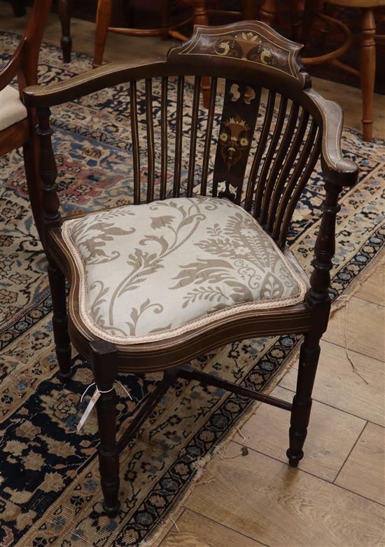 An Edwardian marquetry corner chair